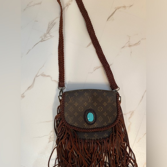 Authentic LV bag from vintage boho bags. It’s called the World Traveller. - Picture 2 of 4